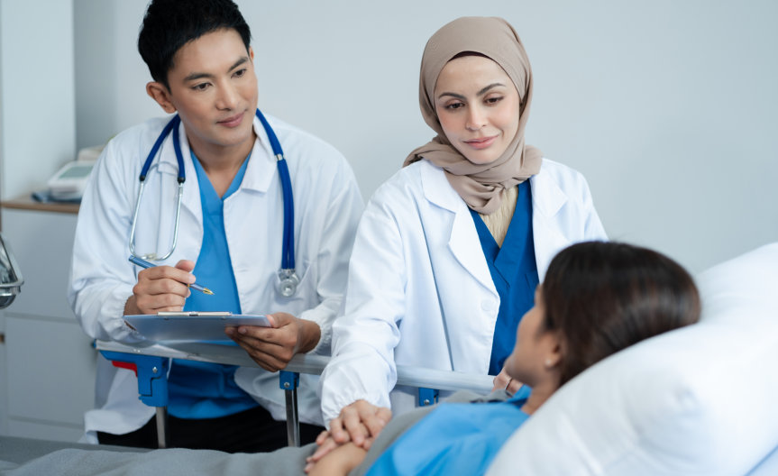 doctors checking patient